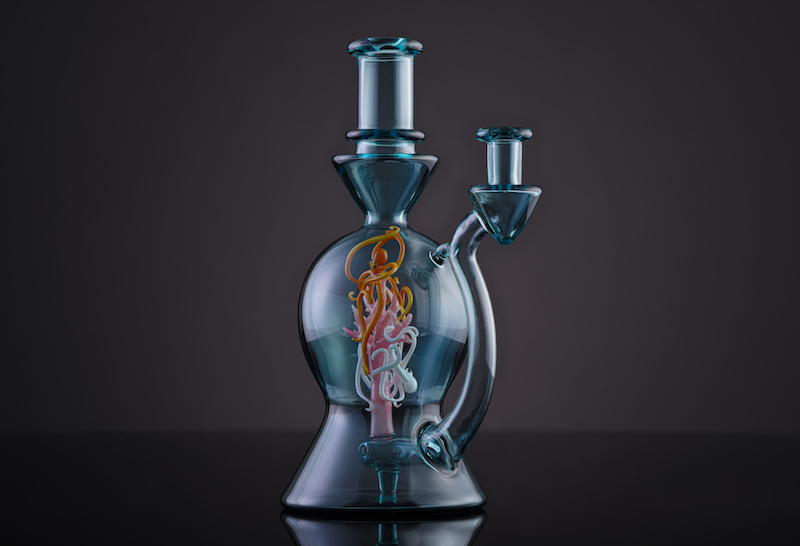 Light blue dab rig with with colorful aquatic inner chamber