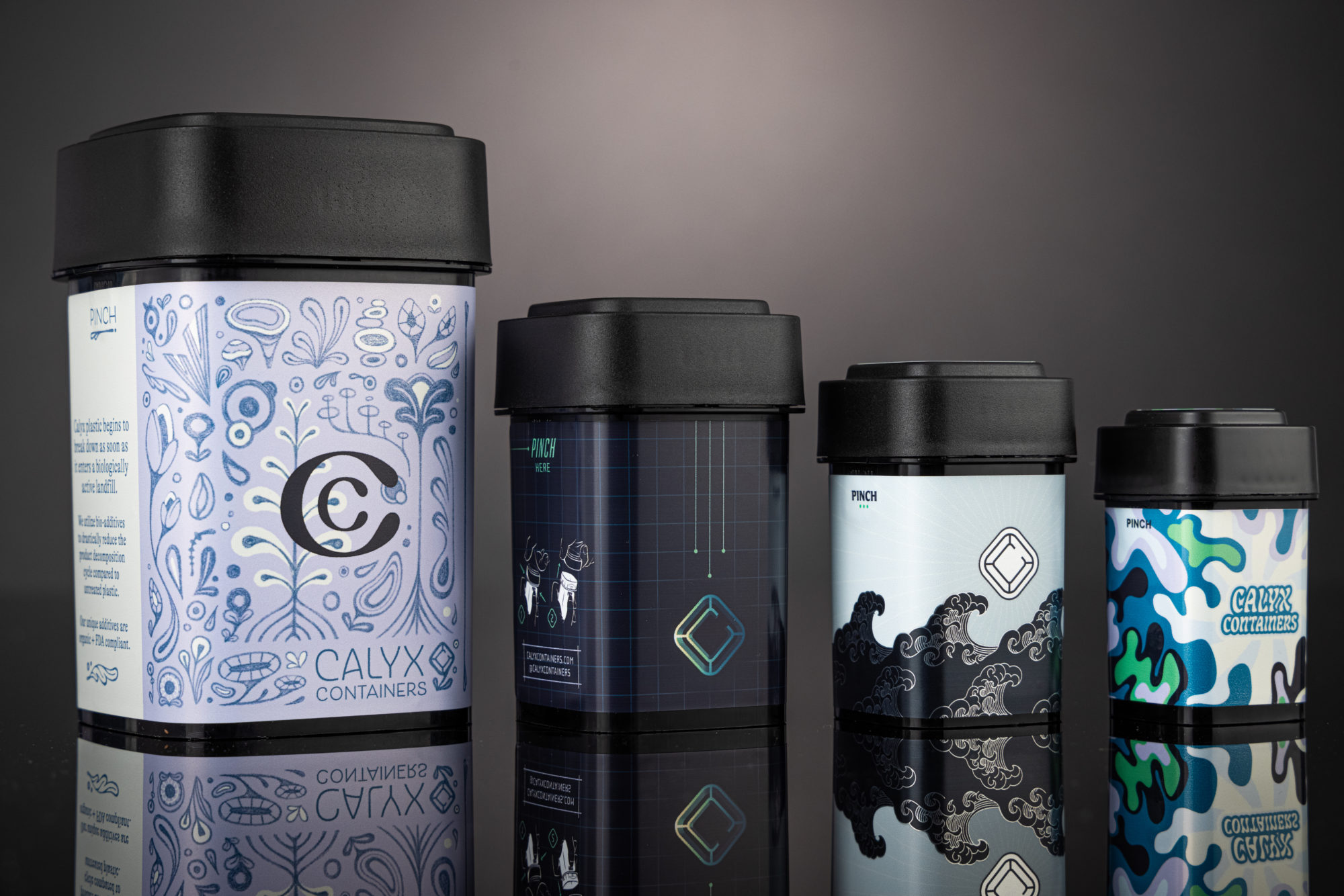 Calyx Containers product line-up showing different size containers with custom logos